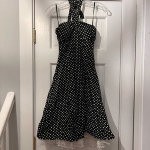 Black and white polka dot fit and flare halter dress